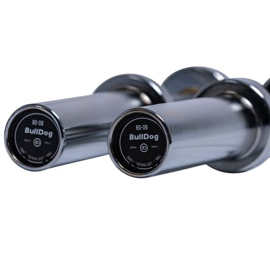 Barra Olímpica tipo mancuerna de pesos variables. Las mancuernas pesan 11LB cada una. Un producto ideal para acompañar nuestros discos de pesos fraccionados.